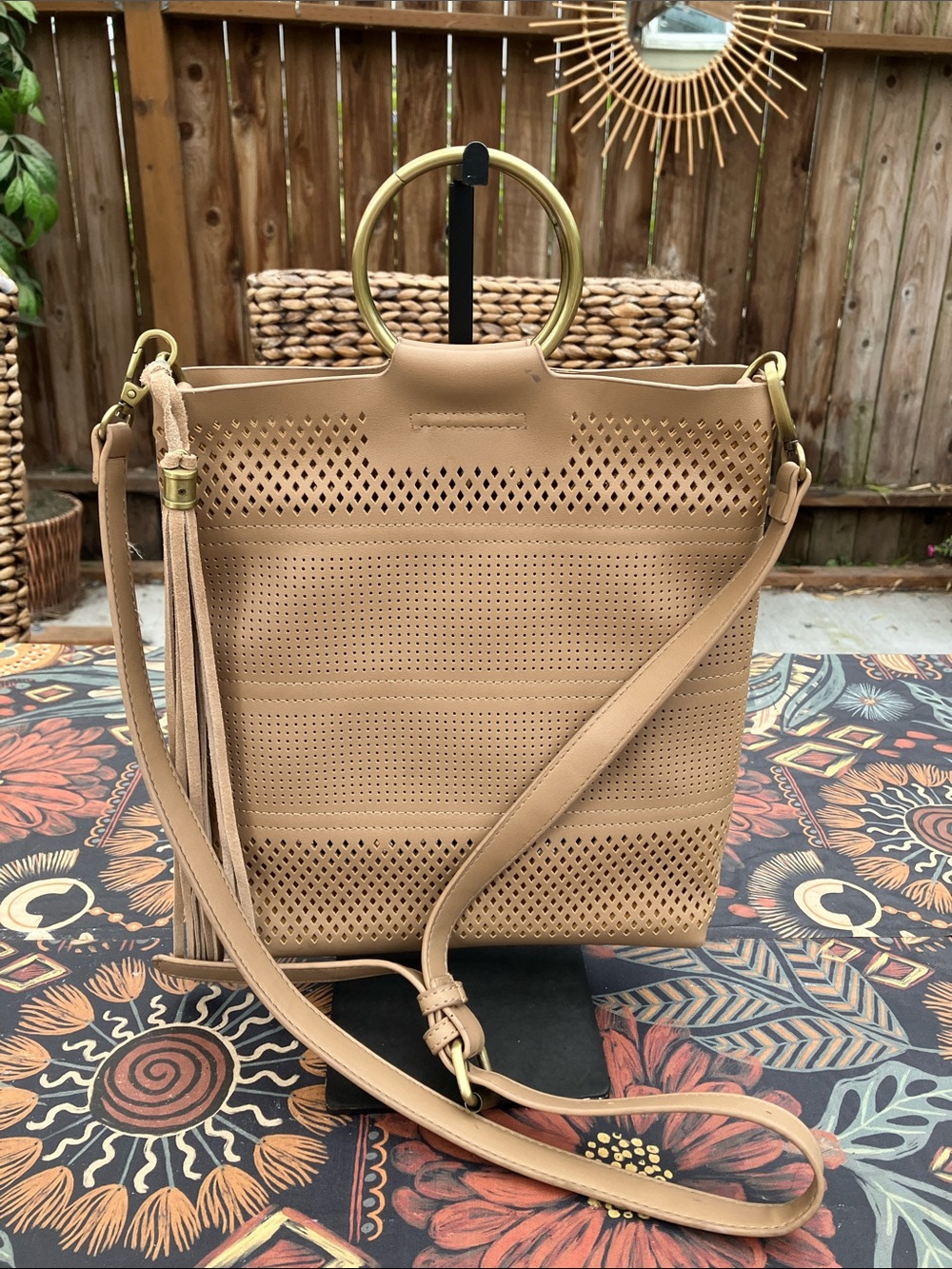 Anthropologie Ring Handle Perforated Camel Colored Crossbody with Tassel